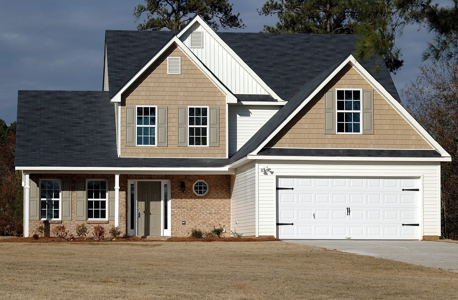Older wood-frame home exterior in a Denver, CO neighborhood